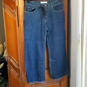 TOMMY HILFIGER WOMEN'S BLUE JEANS. SIZE 10. RAW HEM WIDE LEG. BELT LOOPS AND TIE